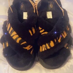 UGG Black and Orange Cozy Slippers women’s size 8, youth size 6 (used)